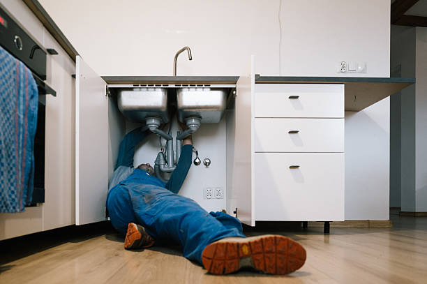 Professional Emergency Plumber technician working in Vaiden, MS